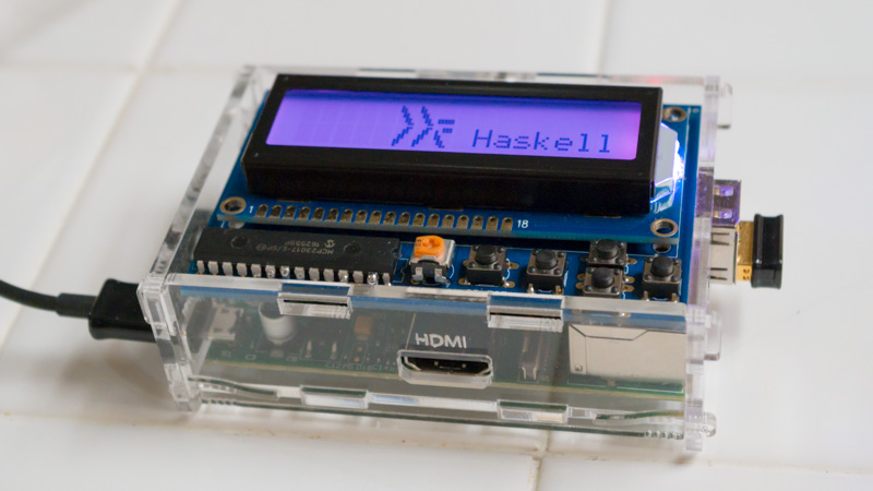 Haskell logo displayed on an LCD